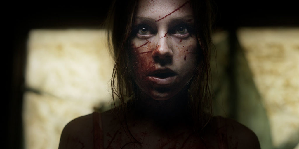 Still from the film Venus of a cut and bloody young woman