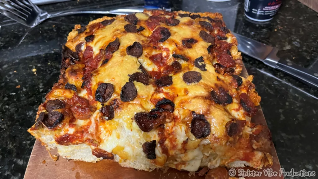 photo of Detroit pizza on cutting board