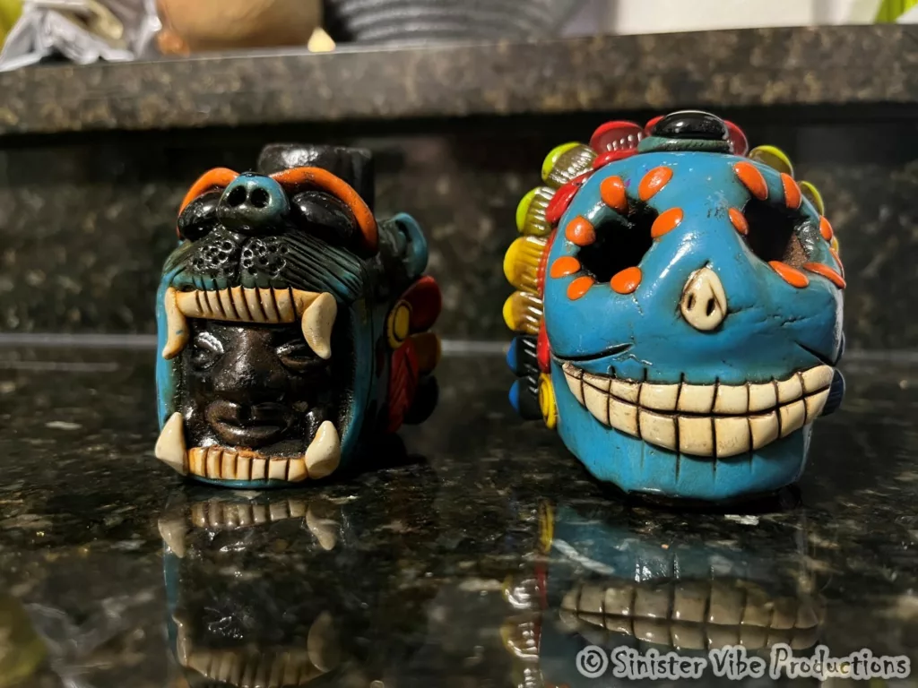 Photo of screaming Aztec death whistle and Aztec jaguar whistle
